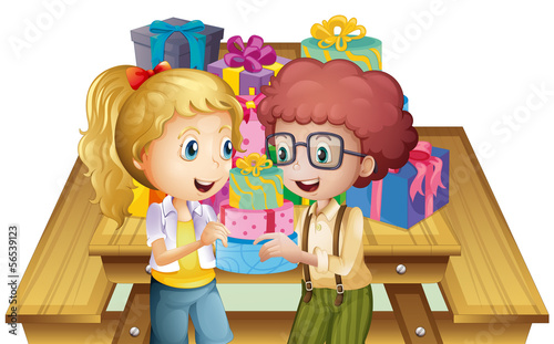 Two adorable kids near the table with many gifts
