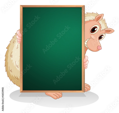 An animal at the back of an empty blackboard