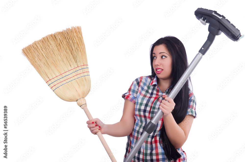 Young housewife doing housekeeping on white Young housewife doing housekeeping on white