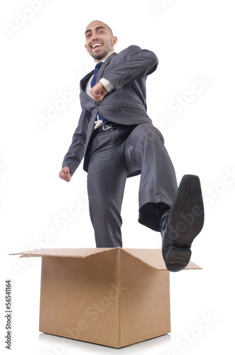 Businessman with box isolated on the white