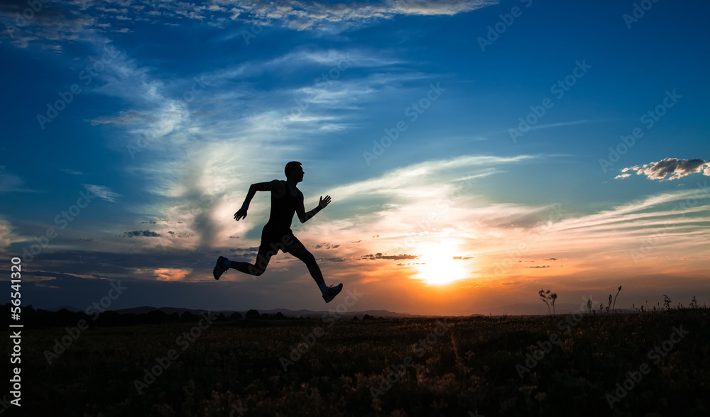 Silhouette man running and jumping