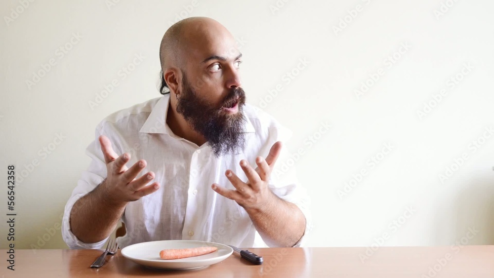 crazy funny bearded man eating a carrot crazy funny bearded man eating a carrot
