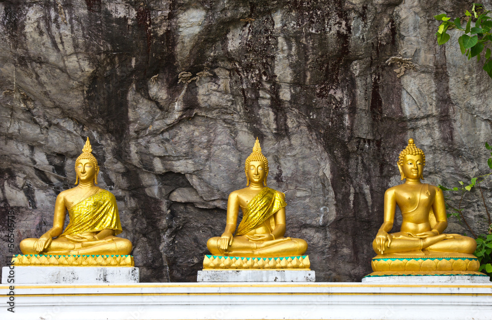 Three Lord Buddha statue in the cave Thailand Three Lord Buddha statue in the cave Thailand