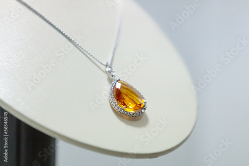 Close up of yellow sapphire necklace on the showcase