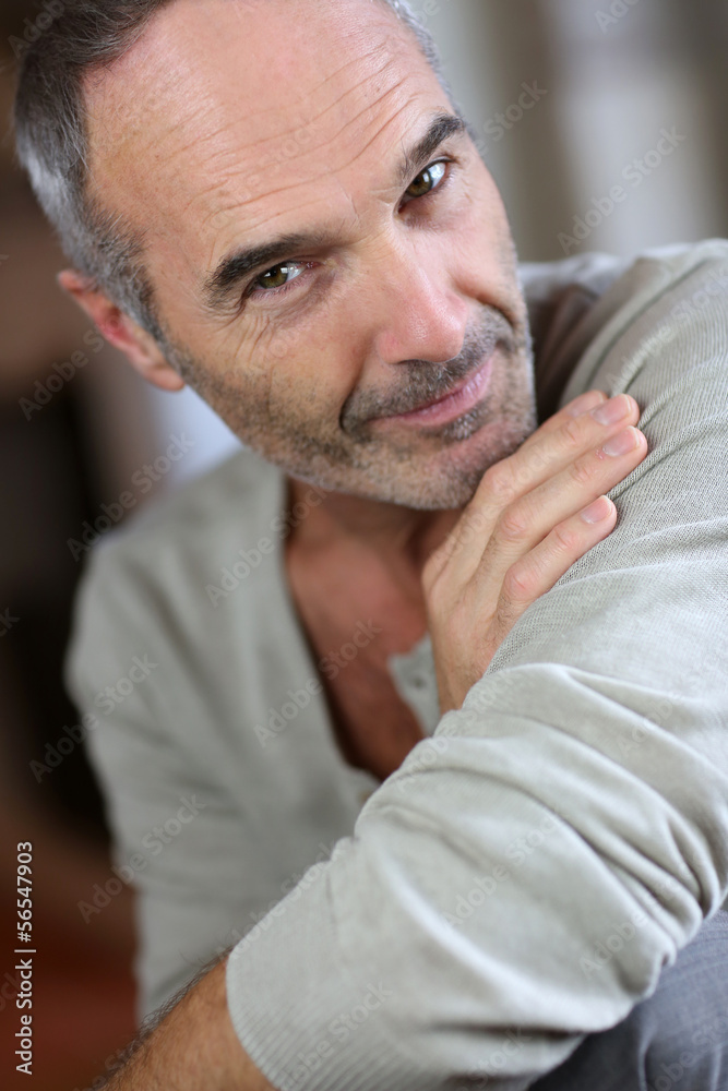 Fototapeta premium Portrait of handsome mature man at home