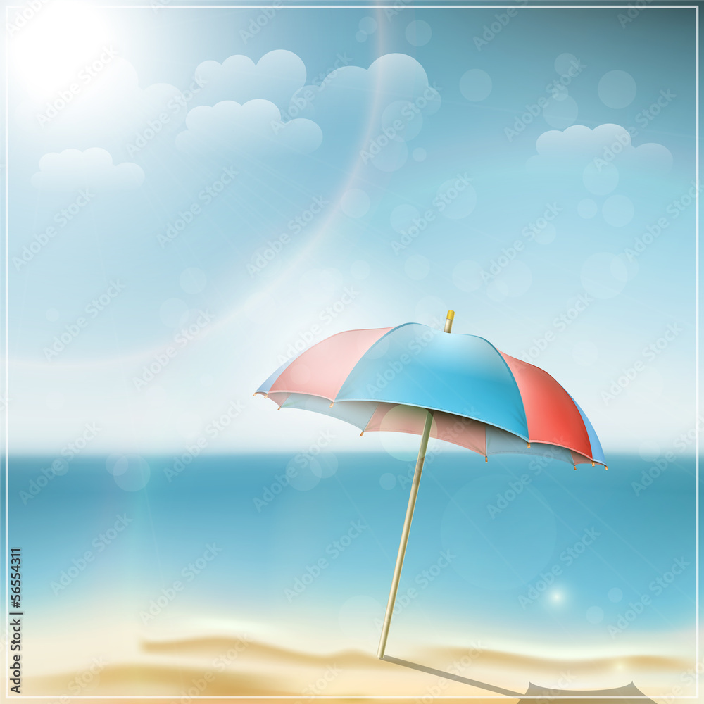 Summer day on ocean beach with umbrella