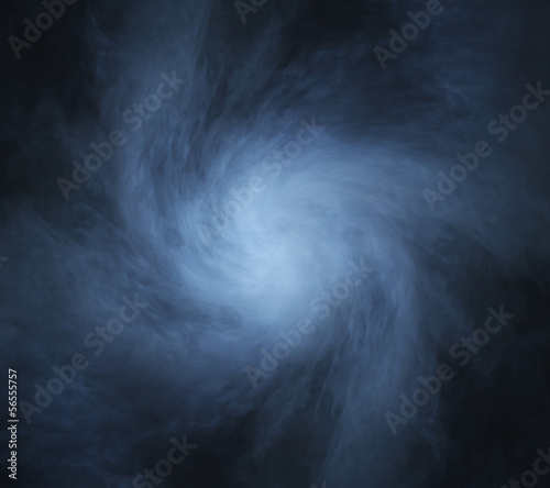 A deep blue smoke background image with light in the center
