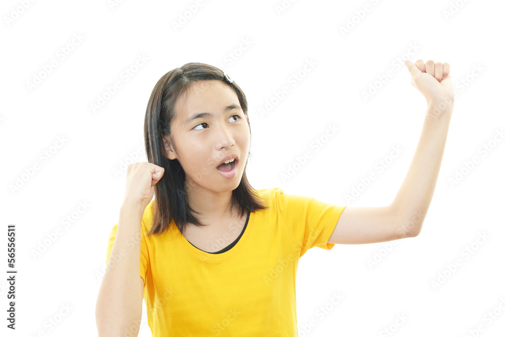 Fototapeta premium ガッツポーズの中学生