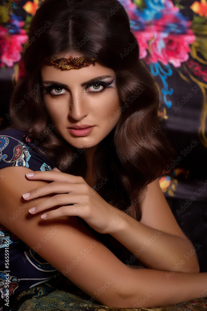 Fototapeta premium Portrait of beautiful young woman with makeup