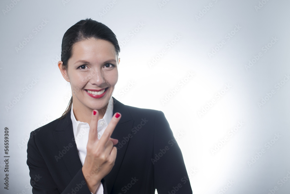 Jubilant businesswoman cheering Jubilant businesswoman cheering