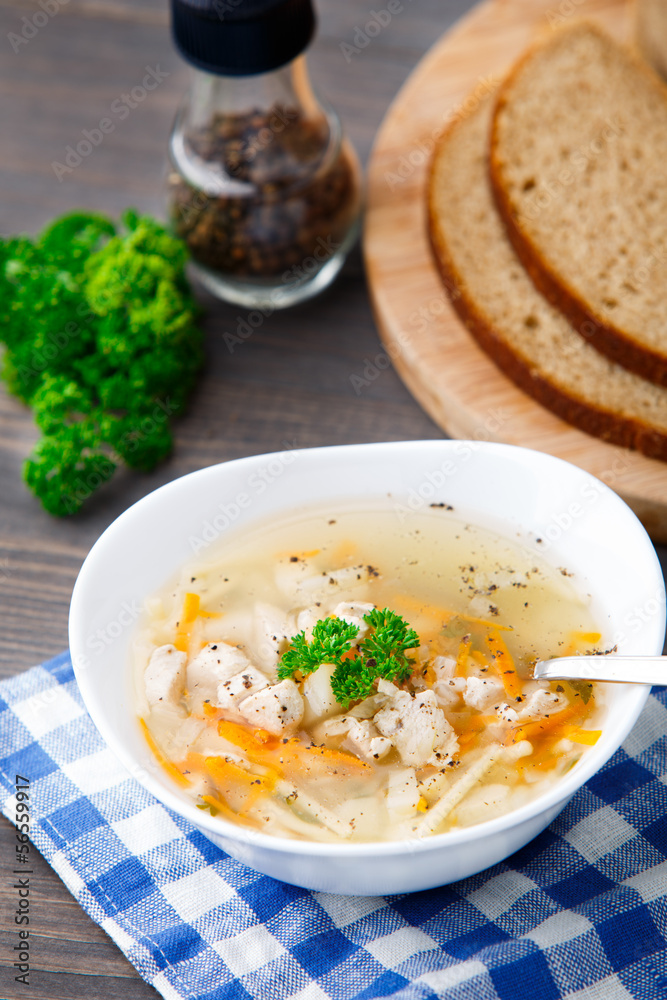 Bowl of chicken soup with vegetables and noodles Bowl of chicken soup with vegetables and noodles