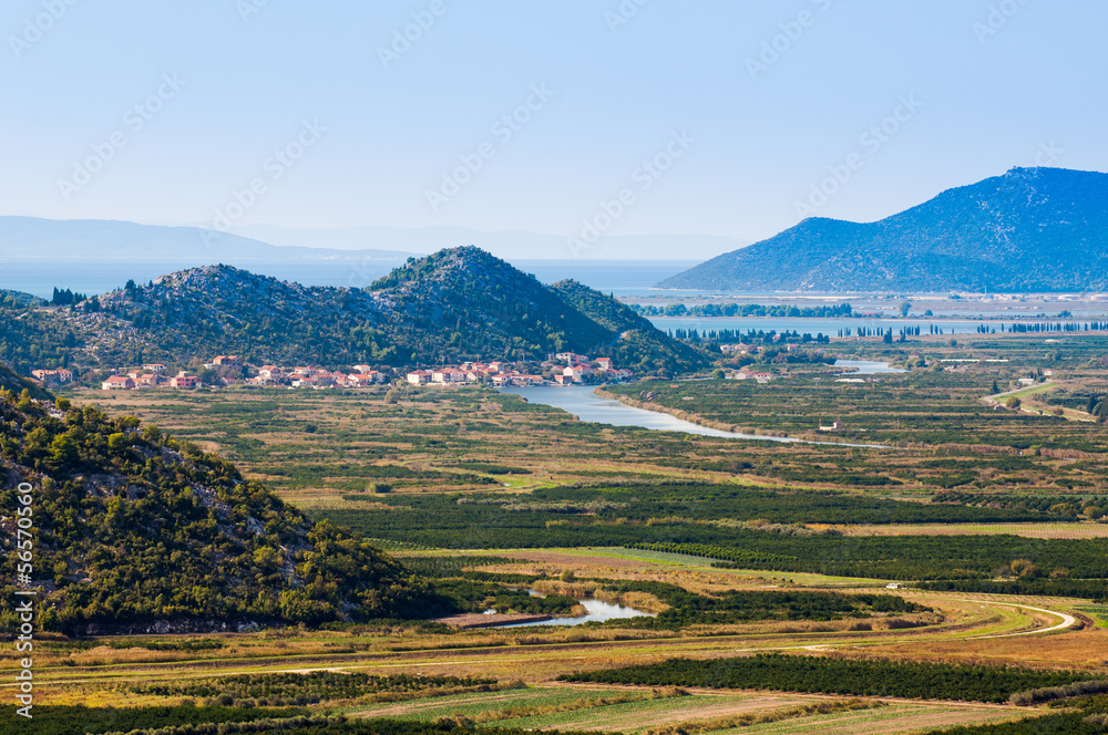 Neretva valley with hills and sea in background