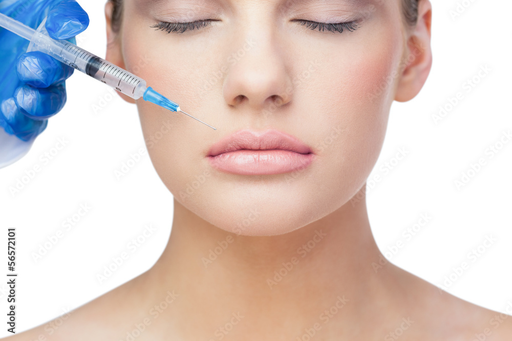 Relaxed beautiful blonde having injection above the lips Relaxed beautiful blonde having injection above the lips