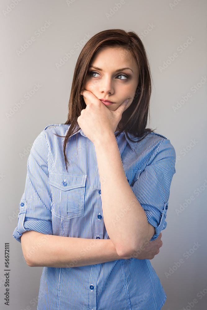 Pensive serious brunette posing Pensive serious brunette posing