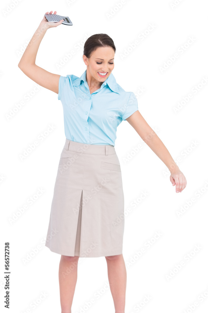 Angry classy businesswoman throwing her calculator Angry classy businesswoman throwing her calculator