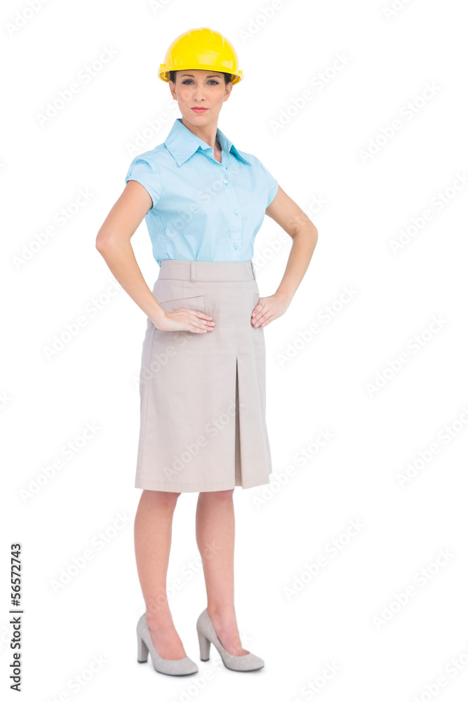 Unsmiling attractive architect posing Unsmiling attractive architect posing