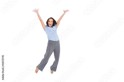 Cheerful classy businesswoman jumping