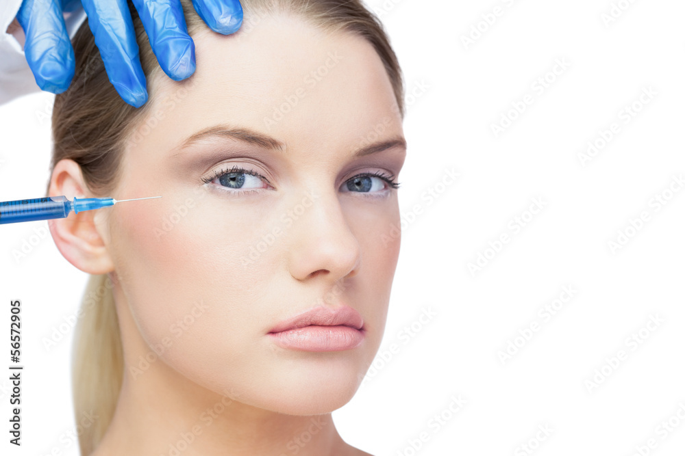 Attractive young model having botox injection