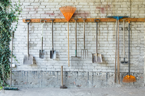 Group of garden tools on a wall