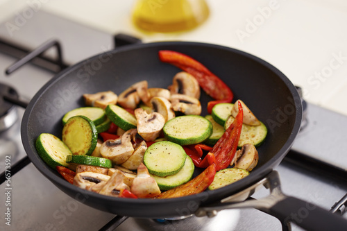 Preparing grilled vegetables in a pan
