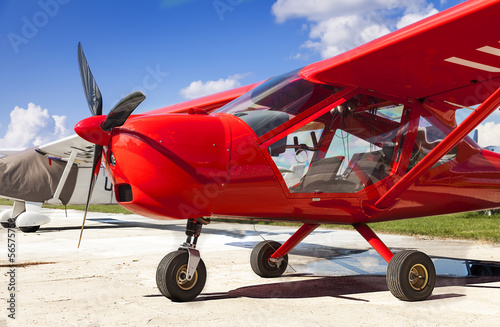 Red two-seater mini plane