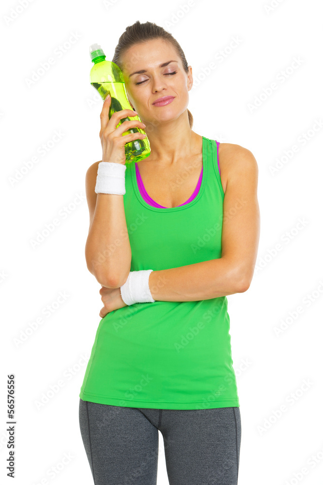 Happy fitness young woman enjoying cold bottle of water Happy fitness young woman enjoying cold bottle of water