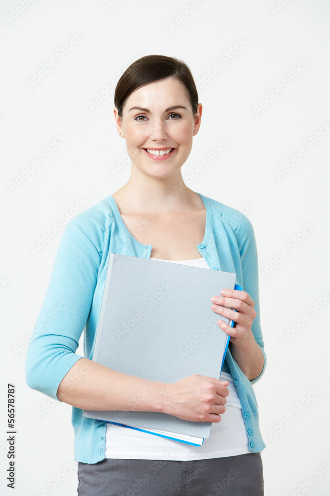 Studio Portrait Of Female Pre School Teacher Studio Portrait Of Female Pre School Teacher
