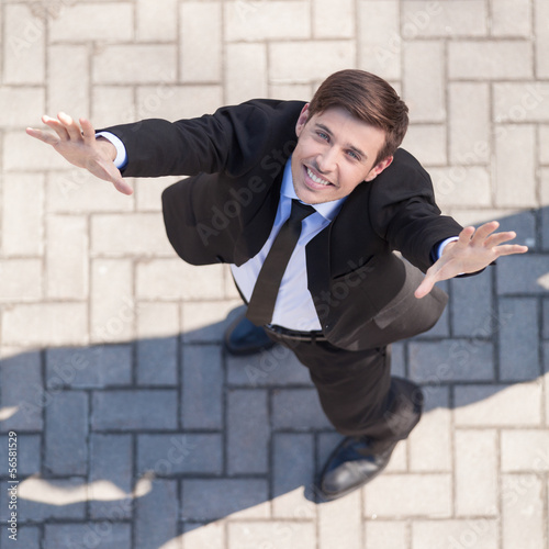 Happy businessman. Top view of cheerful young men in formalwear © BlueSkyImages