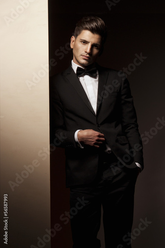 Sexy young man in suit photo