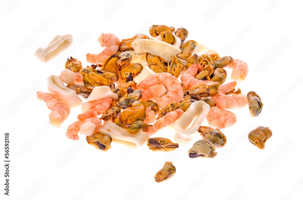Mix of king prawns, mussels and calamari isolated on white Mix of king prawns, mussels and calamari isolated on white