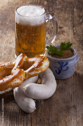 Bayerische Weißwurst mit Bretzel und Bier photo