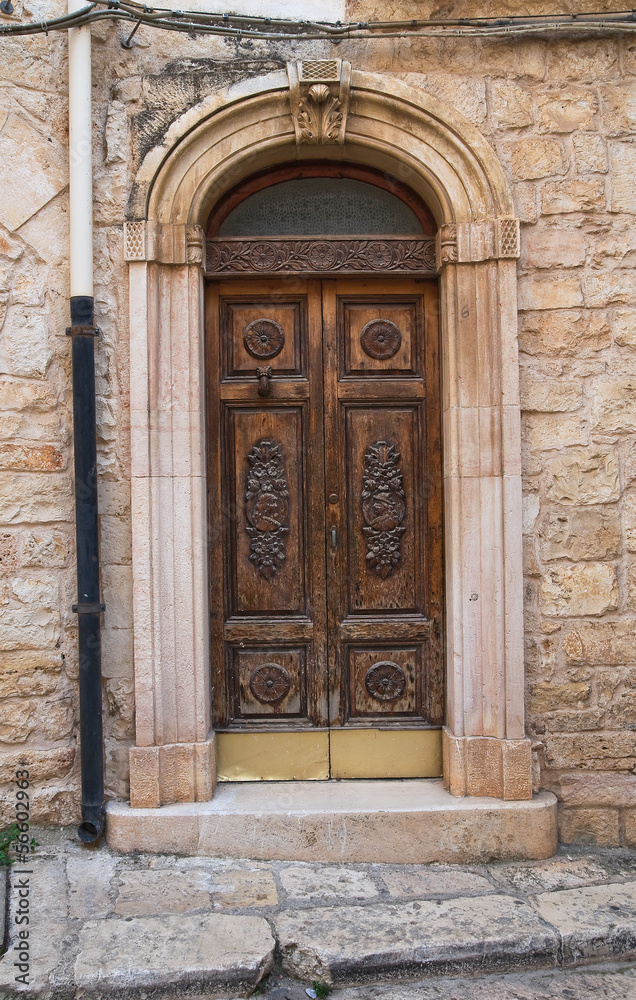 Wooden door. Conversano. Puglia. Italy.