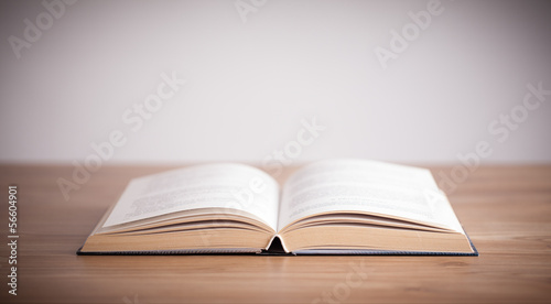 Open Book on wood background