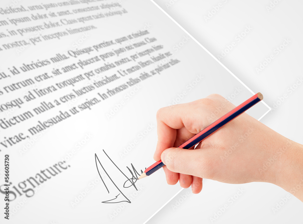 Hand writing personal signature on a paper form Hand writing personal signature on a paper form