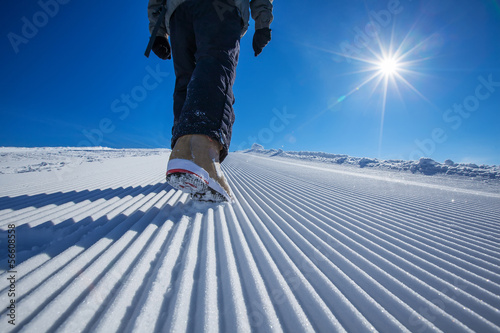 Skier is posing at camera at Gudauri resort in high mountaing of photo