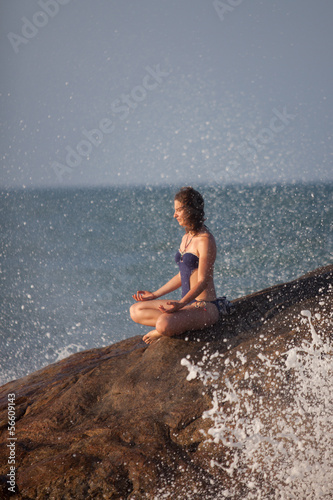 Woman takes rest at the sea shore