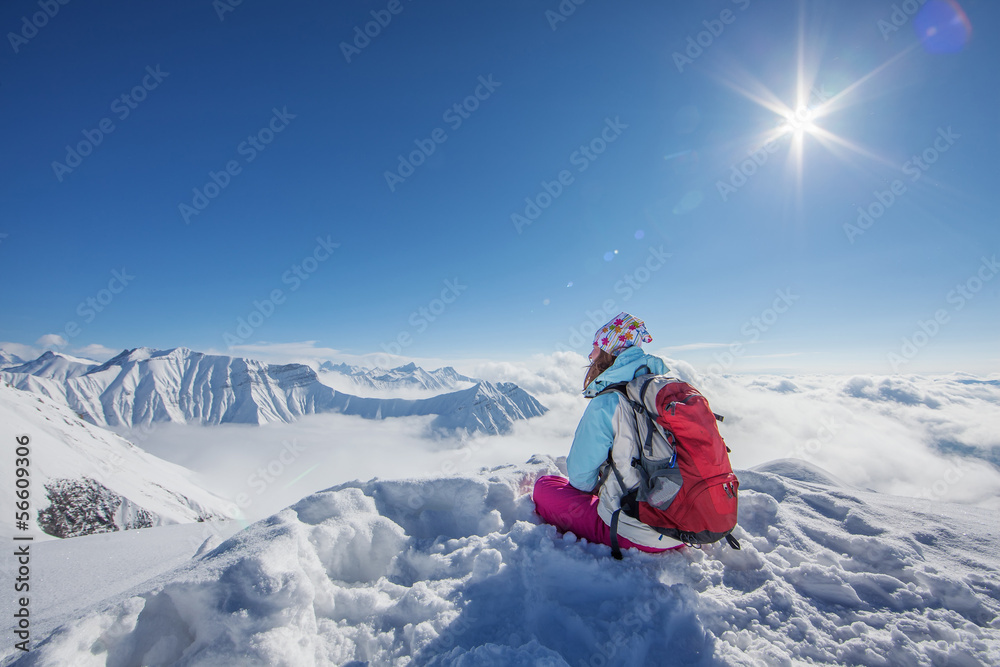 Hiker in winter mountains