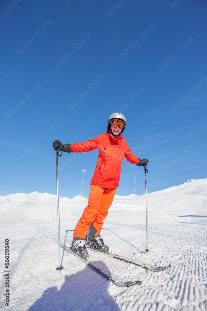 Skier is posing at camera at Gudauri resort in high mountaing of