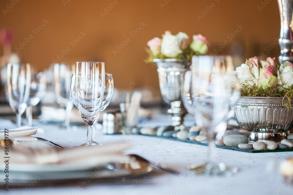 Decorated table with glassware and cutlery Decorated table with glassware and cutlery