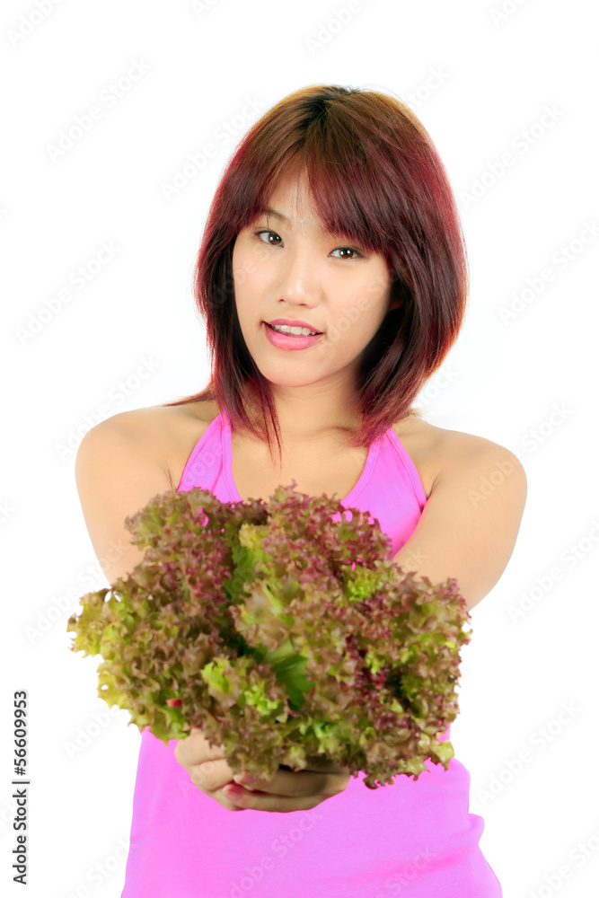 Isolated Young Asian woman with vegetable Isolated Young Asian woman with vegetable