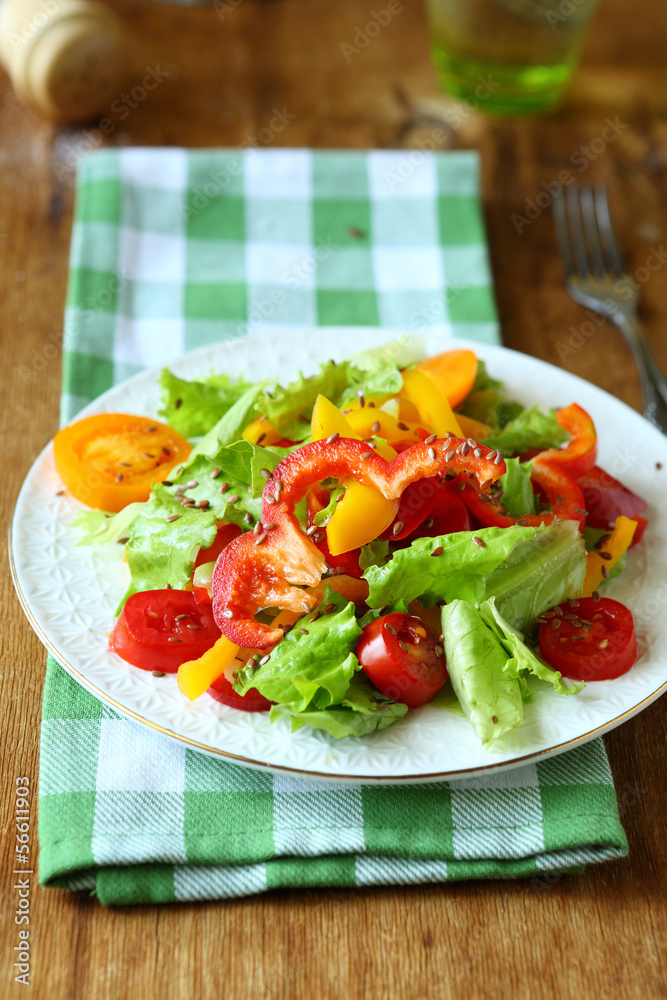salad with red and yellow peppers and lettuce salad with red and yellow peppers and lettuce