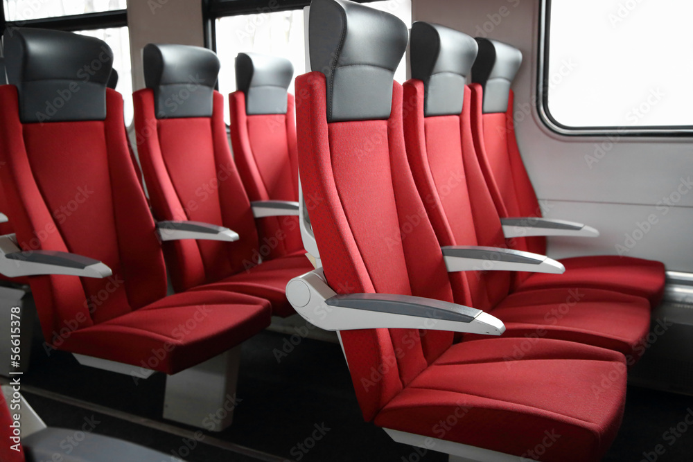 Fototapeta premium rows of red seats in train