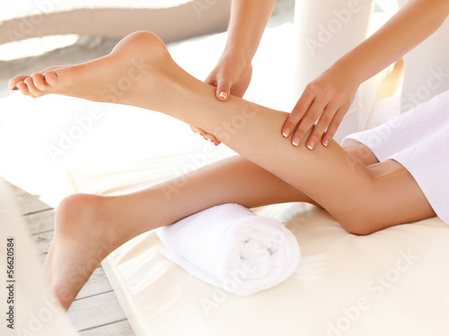  Close-up of a Young Woman Getting Spa Treatment. Foot Massage.
