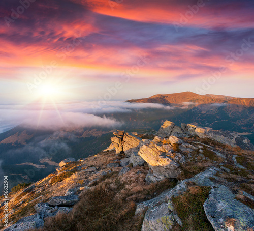 Colorful autumn sunrise in the Carpathian mountains.