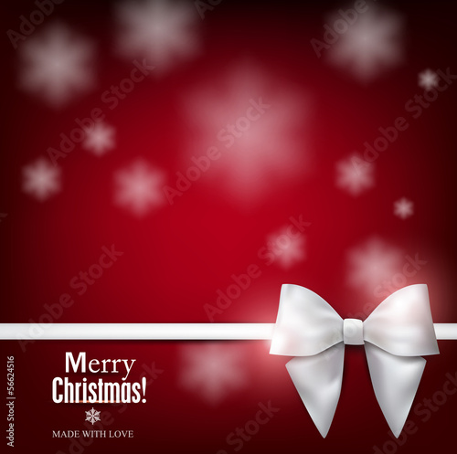 Elegant Christmas background with white bow, snowflakes and plac