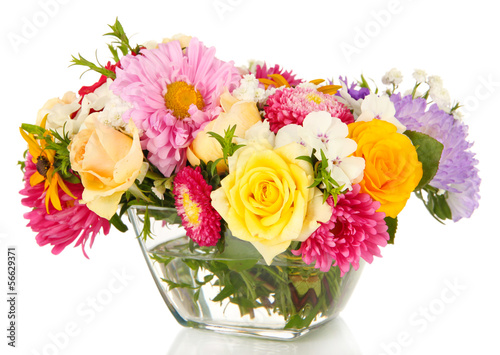 Beautiful bouquet of bright flowers in glass vase, isolated © Africa Studio
