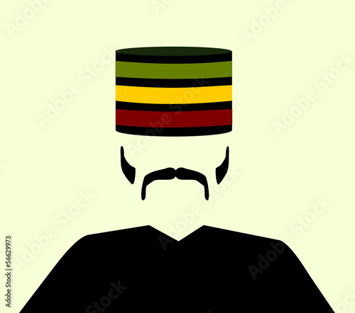 man wearing traditional african kufi cap