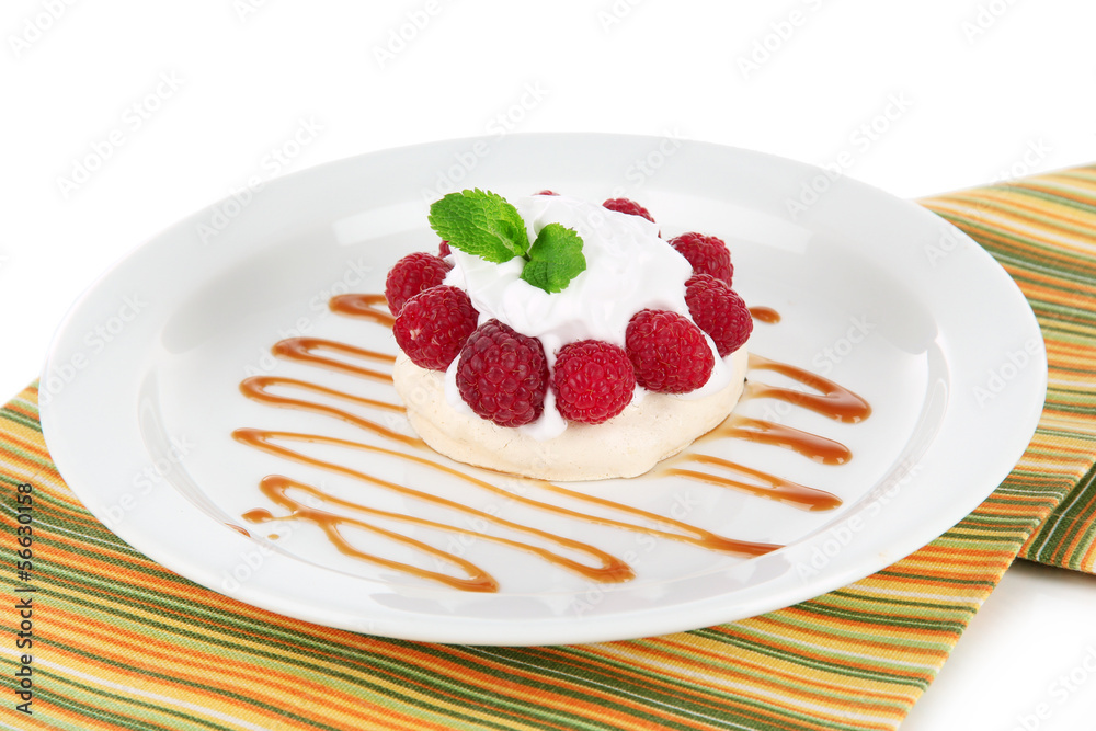 Tasty meringue cake with berries, isolated on white Tasty meringue cake with berries, isolated on white