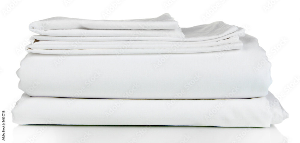 Stack of clean bedding sheets isolated on white Stack of clean bedding sheets isolated on white
