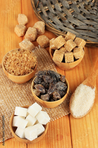 Different types of sugar on table close-up